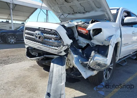 2016 Toyota Tacoma Trd Sport z USA, uszkodzony, nr VIN 3TMAZ5CN3GM006817